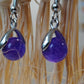 Boucles d'oreilles perle naturelle violette posée sur étrier argenté - BO072